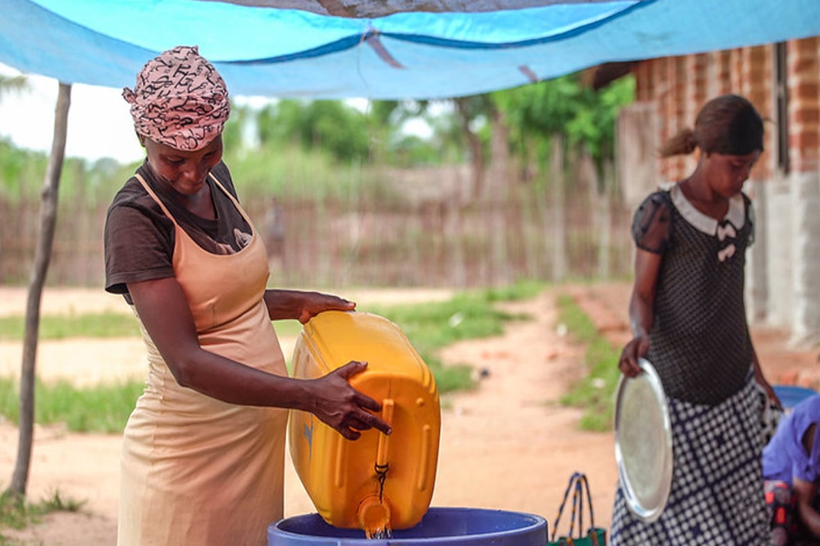 Fetching and filtering water in Lileko, the Democratic Republic of the Congo. Filtering water is crucial to prevent the Guinea-worm disease.
